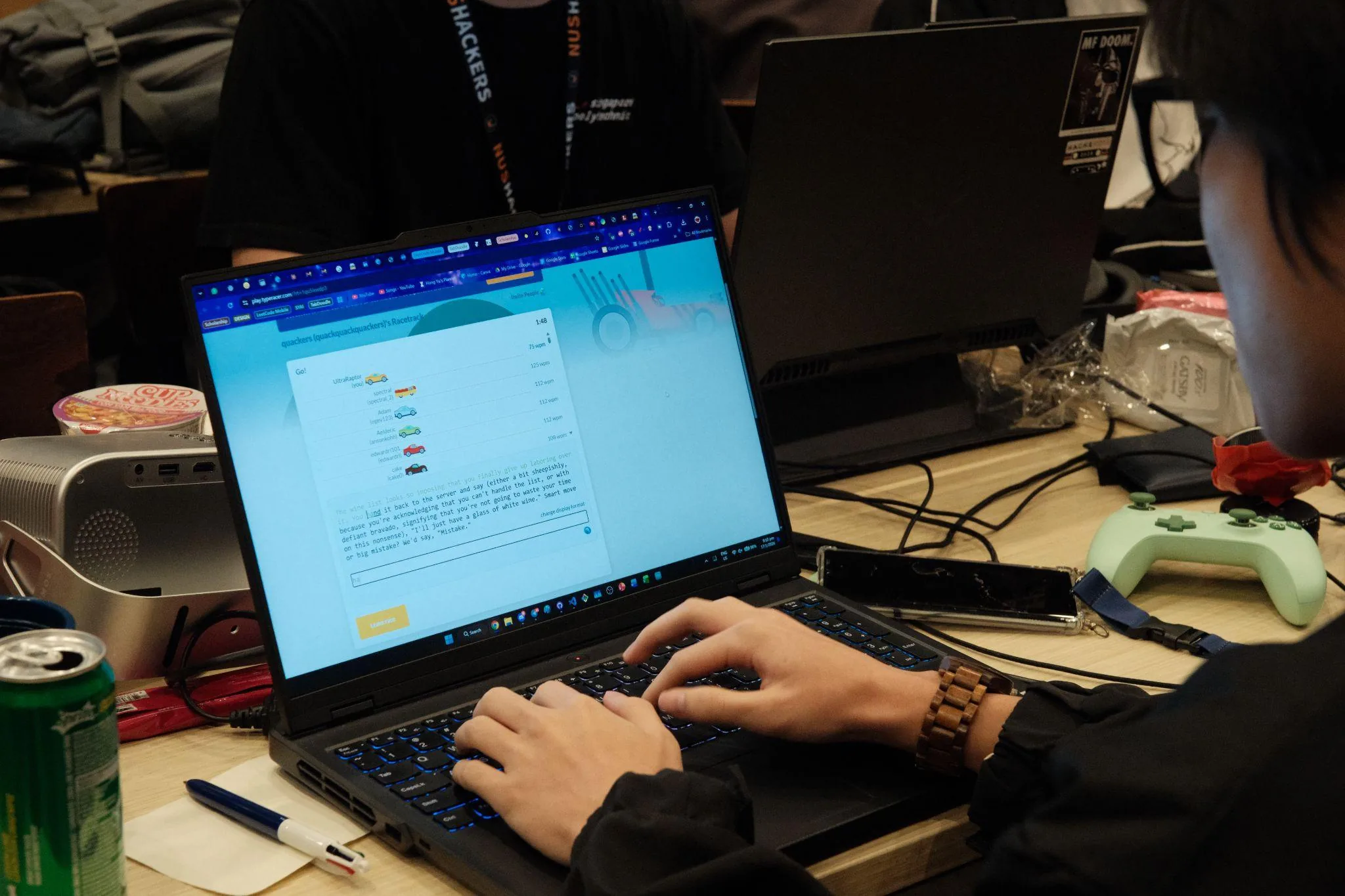 A participant plays Typeracer during Hack&Roll 2026